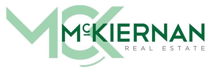 McKiernan Real Estate Logo Alice in Wonderland, McKiernan Real Estate Logo